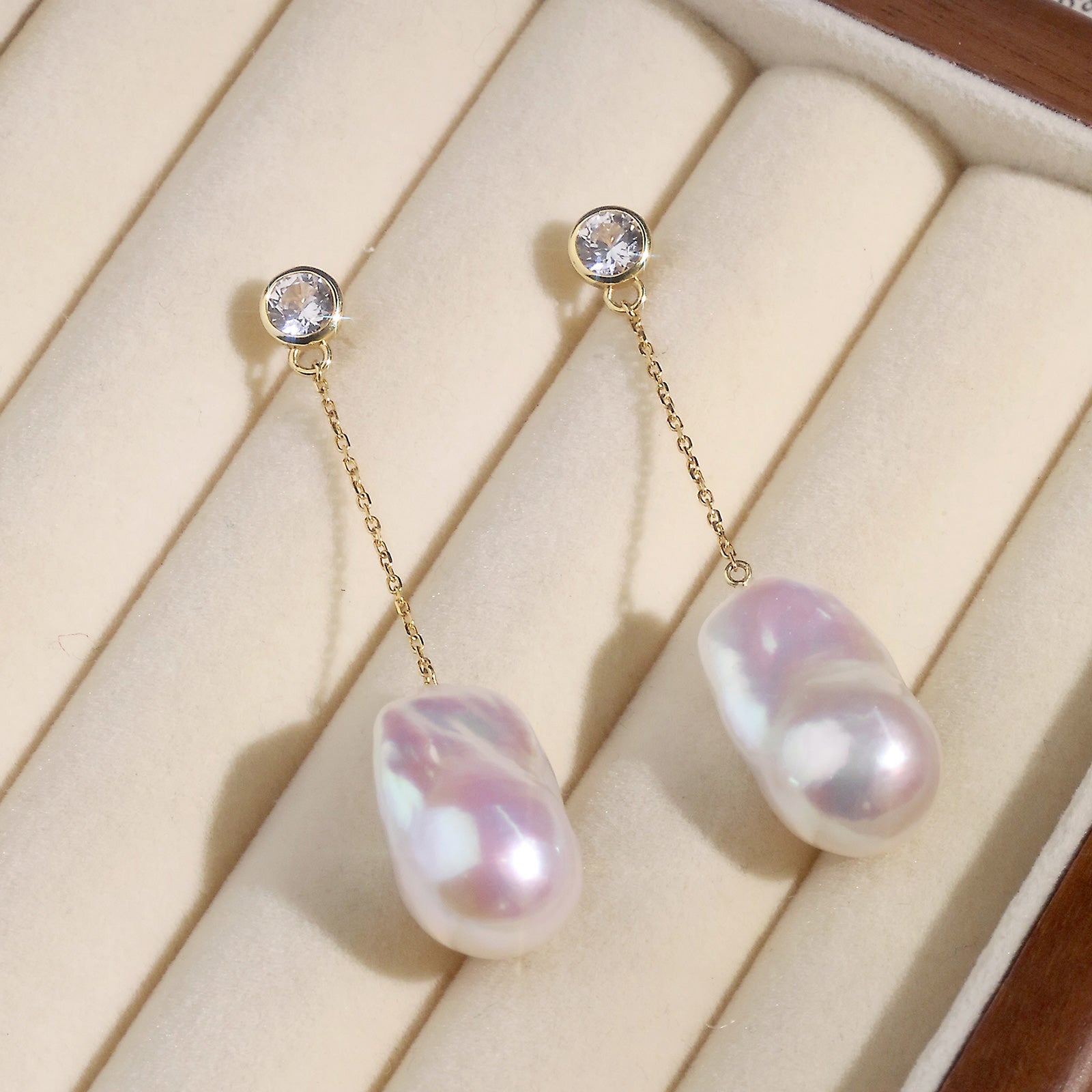 Aura Pearl PLE1144-SY pearl chain drop earrings styled detail