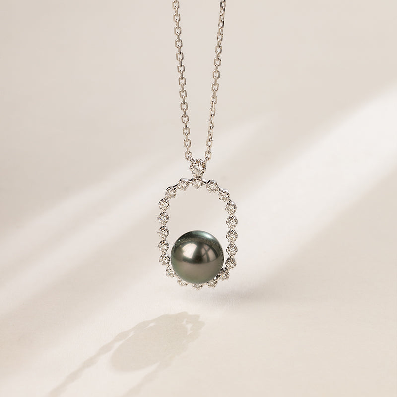 Aura Pearl PLN0884-SW Tahitian pearl pendant necklace on surface