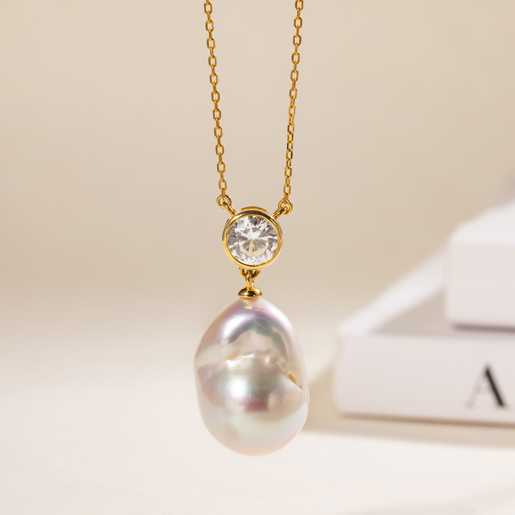 Baroque freshwater pearl and round cubic zirconia pendant necklace in yellow gold color display view