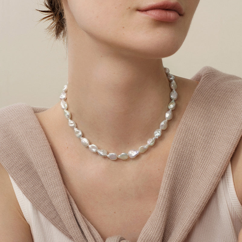 Baroque iridescent freshwater pearl strand necklace styled on model