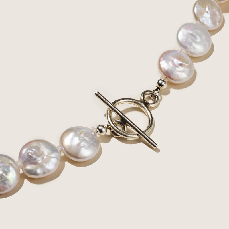 Button iridescent freshwater pearl strand necklace clasp detail