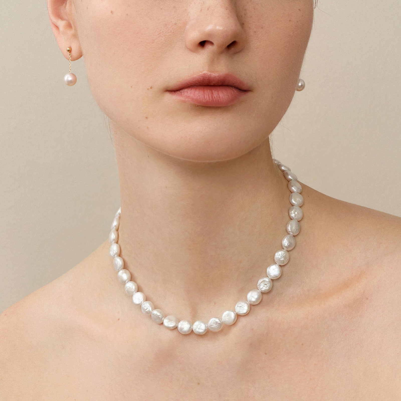 Button iridescent freshwater pearl strand necklace layering view