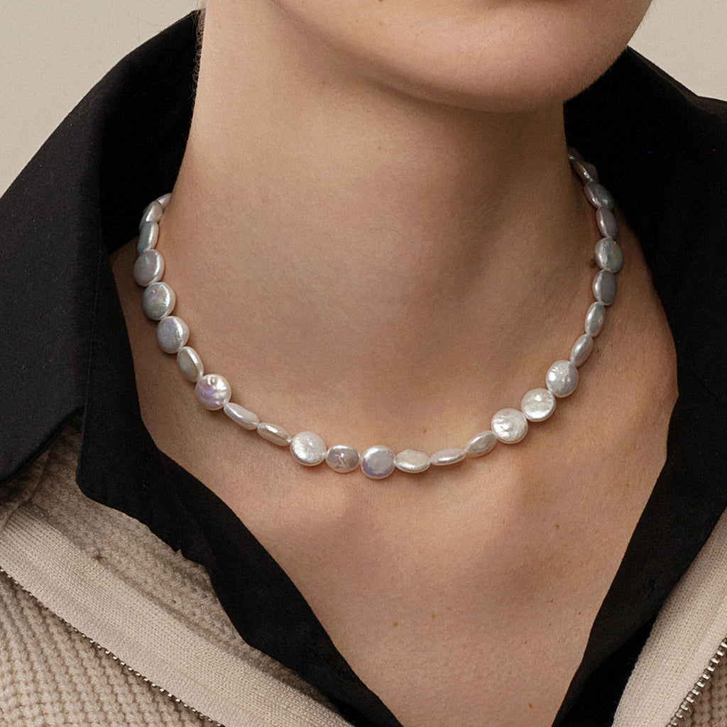 Button iridescent freshwater pearl strand necklace styled on model