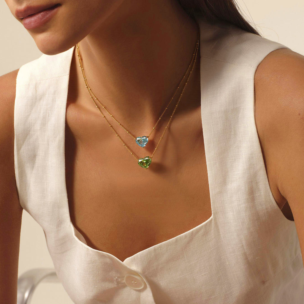 Model layering blue and green heart cubic zirconia pendant necklaces