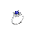 Round blue lab-created sapphire floral halo ring in sterling silver, angled view