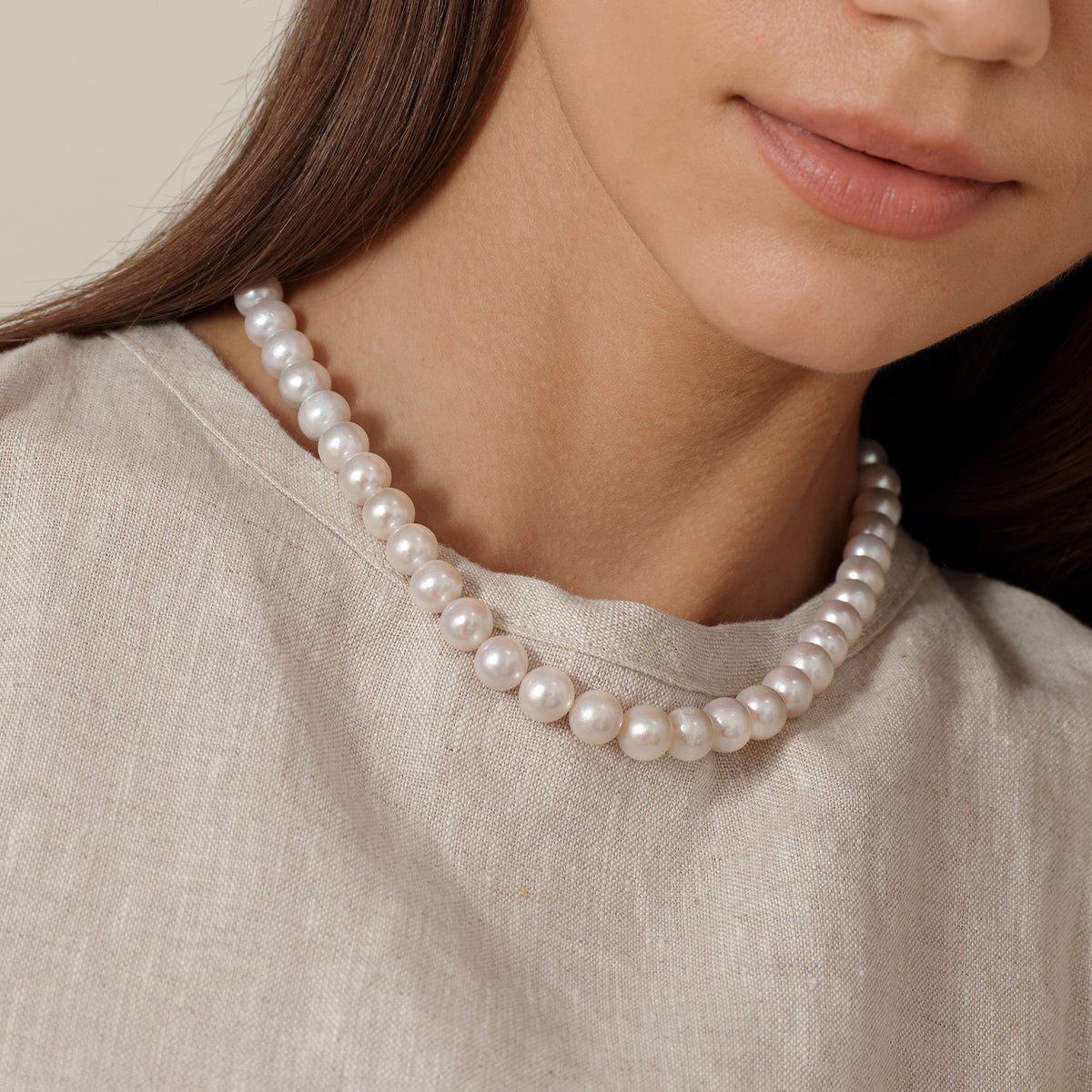 Side worn view of the 8.0-9.0mm freshwater pearl strand necklace
