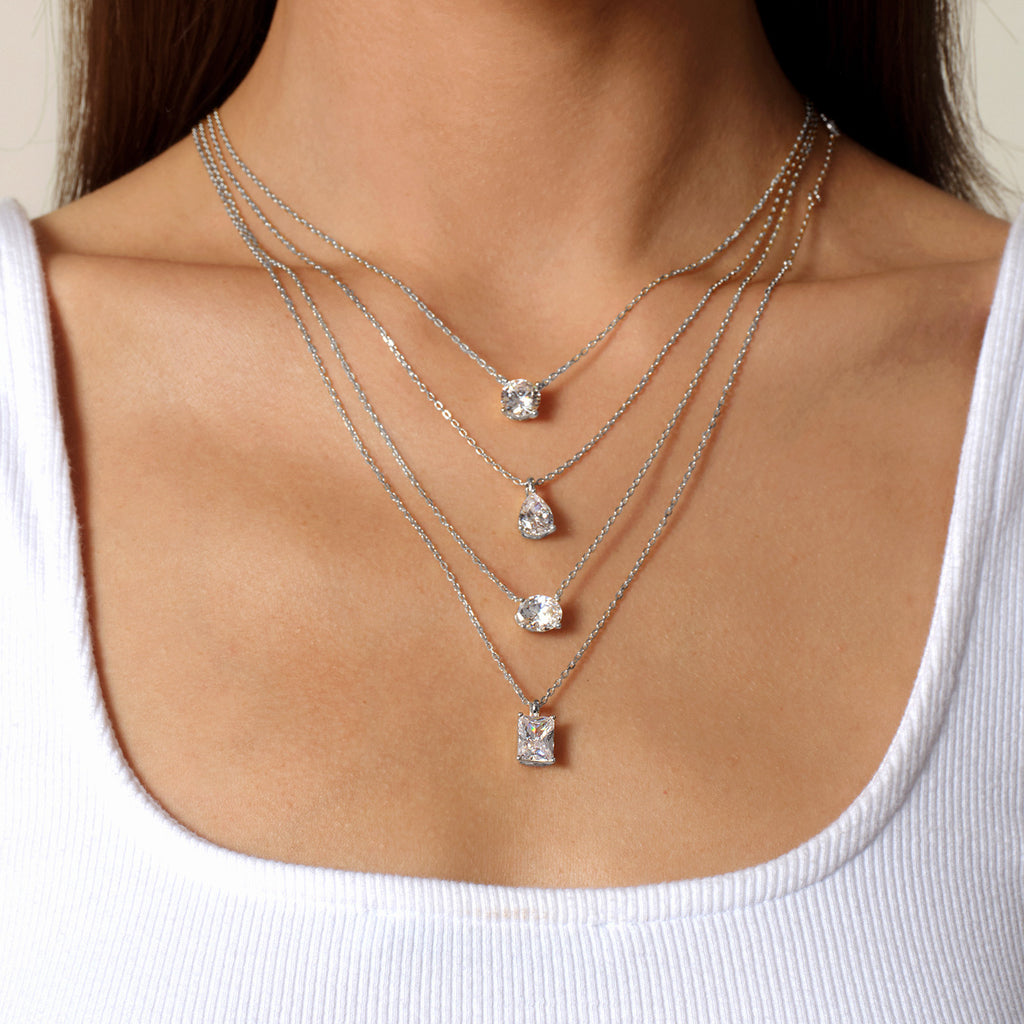 Round cubic zirconia solitaire pendant necklace in white gold color layering view