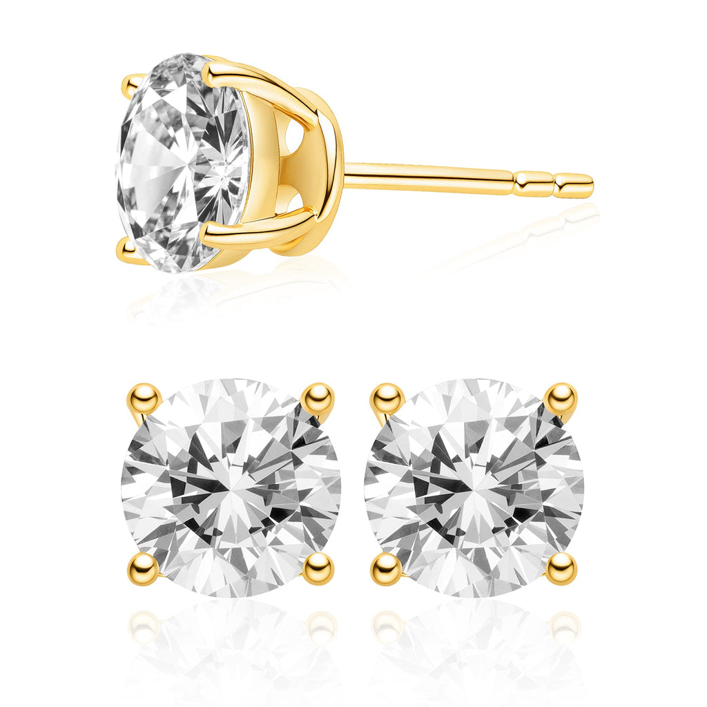 Model wearing round cubic zirconia stud earrings in gold color