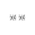 Round cubic zirconia stud earrings in silver color, black background front view